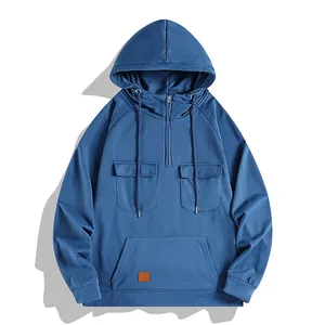 Vista detallada frontal de sudadera azul vintage pesada con media cremallera y bolsillos