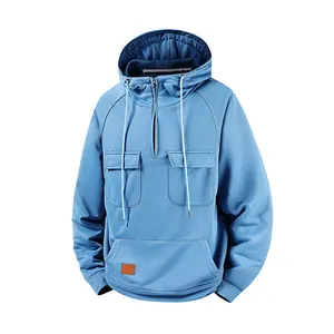 Front view detail of men's blue hooded sweatshirt featuring half-zip and pockets