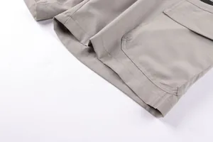 Macro view showing the durable texture and double stitching of men cargo shorts pocket