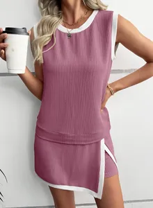 Detail of mauve ribbed knit sleeveless top and shorts set with white contrast trim