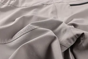 Detailed view of the durable ripstop fabric and stitching on men's outdoor cargo shorts