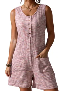 Macro view of women's waffle knit texture on a sleeveless summer romper with button detail