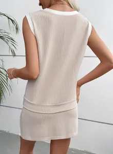 Close-up back view of a stylish beige ribbed sleeveless top and matching shorts
