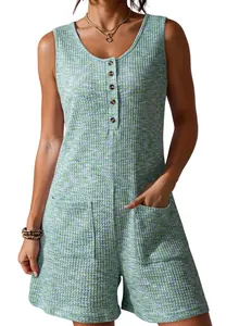 Close-up detail of a green and blue waffle knit sleeveless romper with front buttons.