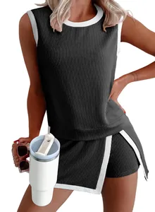 Detail of women's ribbed sleeveless top and shorts set with white trim design details