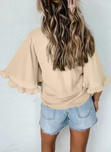 Back view of a stylish beige summer blouse featuring ruffled bell sleeves and round neck.