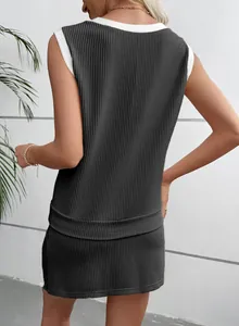 Back view showing the fit and texture of a dark grey ribbed two-piece summer casual outfit