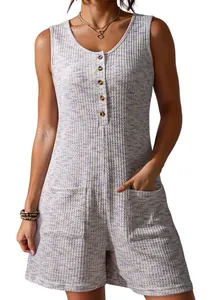 Close-up detail of a sleeveless purple waffle knit romper featuring wooden buttons