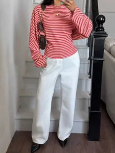 Detailed view of a trendy red and white striped batwing sleeve t-shirt for women