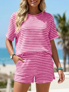 Casual pink striped summer set featuring a round neck top and matching slit shorts