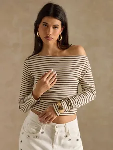 Detail showing the ribbed knit texture and striped pattern of an off-shoulder top