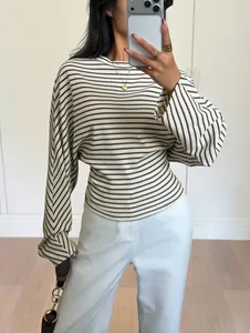 Detailed view of women's striped batwing long sleeve T-shirt with a chic round neck design