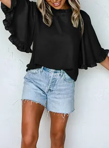 Detail view of stylish black blouse featuring elegant ruffled half-sleeves and crew neck