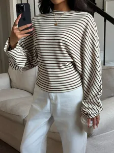 Close-up detail of a stylish striped batwing sleeve T-shirt for chic casual fashion