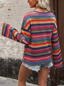 Back view detail of vibrant colorful ethnic patterned long-sleeve bohemian knit sweater