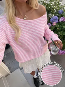 Detail shot highlighting the unique pineapple flower texture on pink striped top
