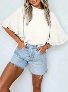 Detailed view of women's white summer blouse with elegant ruffled collar and flared half sleeves