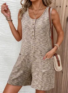 Close-up of women's waffle knit tank romper showing button front and side pocket details.