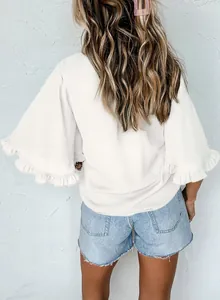 Back view of a chic white women's blouse with elegant ruffled half-sleeves for summer