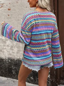 Detailed back view of a colorful zig-zag pattern knitted long-sleeve top for women