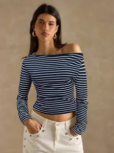 Close-up detail of a navy blue and white striped off-the-shoulder long sleeve T-shirt for women