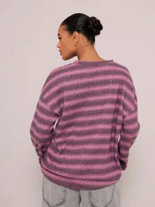 Detailed back view of an oversized purple striped knit sweatshirt for women fall fashion
