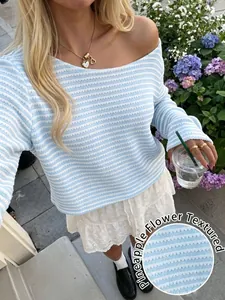 Detail shot of light blue and white pineapple flower textured striped knit top fabric