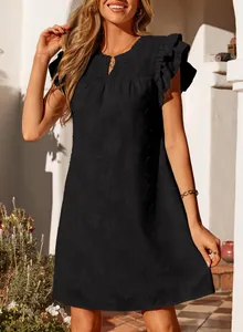 Close-up of elegant V-neck dress featuring double ruffle sleeves and floral texture