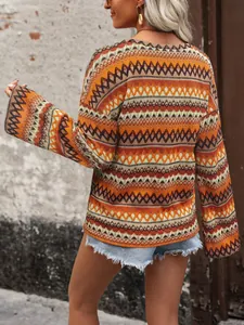 Detailed back view of a colorful loose knit sweater featuring ethnic geometric patterns