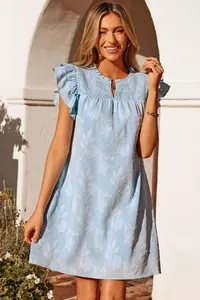 Light blue V-neck floral mini dress with double ruffle sleeves and smocked chest detail.