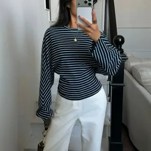Stylish blue and black striped long-sleeve T-shirt with batwing sleeves and round neck