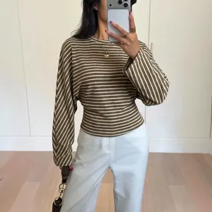 Chic brown and white striped long-sleeved batwing t-shirt with a cinched waist line