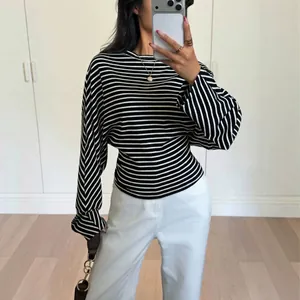 Chic black and white striped long sleeve T-shirt with batwing sleeves and a round neckline