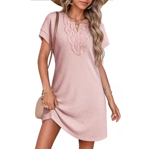 Summer pink waffle knit V-neck mini dress featuring elegant lace trim and short sleeves