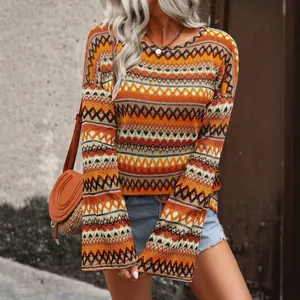 Bohemian style knitted top featuring vibrant geometric patterns and a classic round neck design