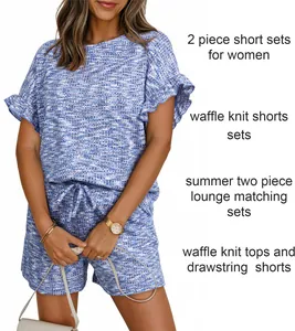 Completo due pezzi da donna in maglia a nido d'ape blu con maniche a volant