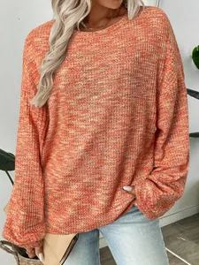 Detail view of colorful waffle knit long sleeve T-shirt showing texture and loose fit