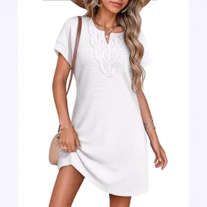 Stylish white waffle knit casual dress featuring delicate lace V-neck and short sleeves