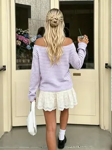 Stylish back view of a casual purple and white striped knit long sleeve top for women