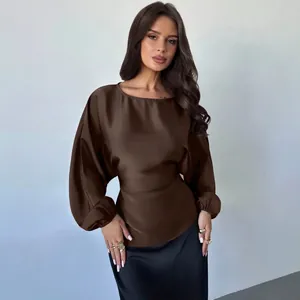 Elegant brown satin long sleeve blouse featuring round neck and stylish batwing sleeves for women