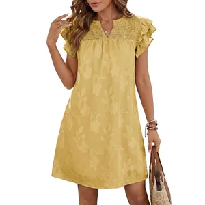 Yellow V-neck summer dress featuring flutter sleeves and smocked floral jacquard pattern