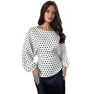 Elegant white satin blouse featuring black polka dots and long lantern sleeves for women