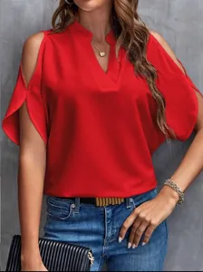 Close-up front view of a vibrant red V-neck cold-shoulder chiffon blouse worn by a model