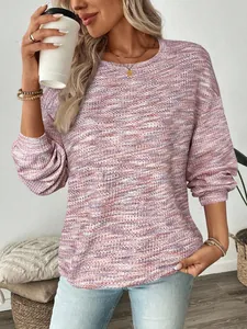 Detail of colorful waffle knit texture on a loose-fit long sleeve autumn T-shirt.