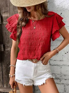 Close-up of a red smocked texture top featuring double layer flutter sleeves style.