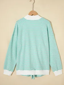 Detailed back view of a mint green striped oversized cotton sweatshirt for women