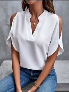 Detailed close-up of a white V-neck chiffon blouse featuring stylish cold-shoulder cutouts.