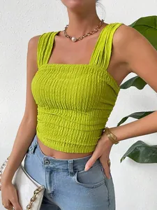 Detailed view of fashionable lime green textured sleeveless square neck smocked crop top
