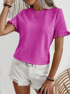 Detailed view of women's fuchsia crew neck T-shirt with textured fabric and ruffle sleeves