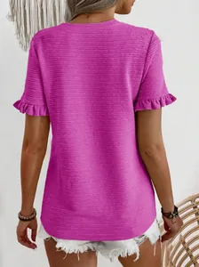 Back view of magenta textured round neck T-shirt with feminine ruffle sleeve details.